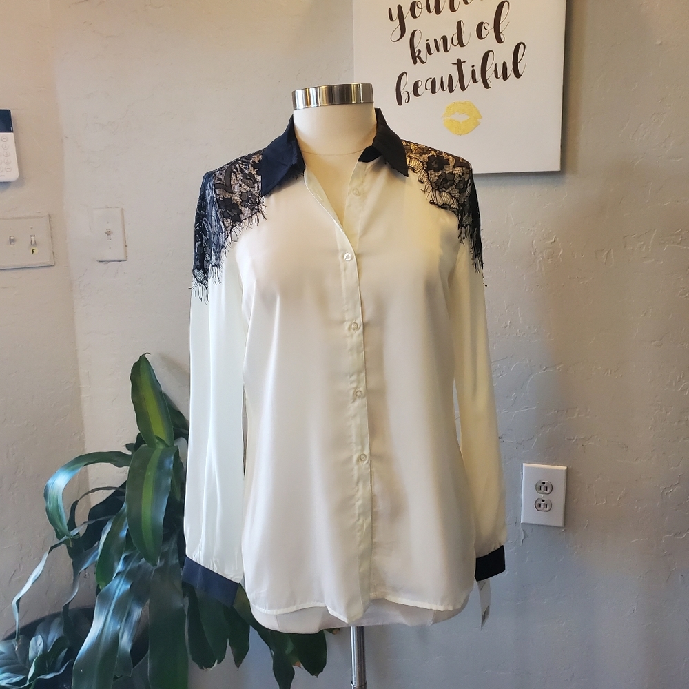 Ivory blouse with black lace accent